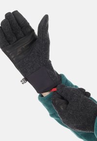Insulated gloves with a black textured leather palm and a dark gray wool blend body. Features a snug cuff with a red pull tab for adjustment.