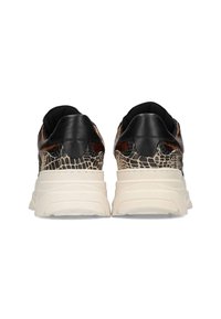 Black and brown sneakers with a textured, reptile-inspired design and a chunky white sole. Rounded heel with contrasting black accents.