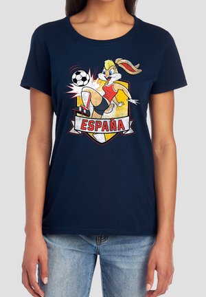 Cartoon rabbit in sportswear kicking a soccer ball with España text on a shield background on a navy blue T-shirt.