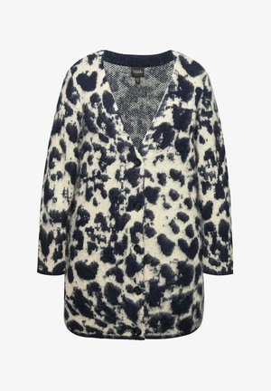 Knit cardigan in cream and navy, featuring a large leopard print design, button front, V-neck, and three-quarter sleeves.