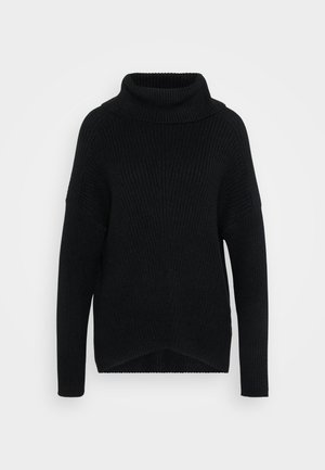 Black ribbed knit turtleneck sweater with long sleeves and dropped shoulders, slightly longer back hem, displayed on plain white background.