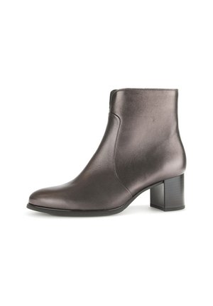 Brown leather ankle boot with a smooth finish, tapered toe, and a block heel. Direct side view highlights sleek design.