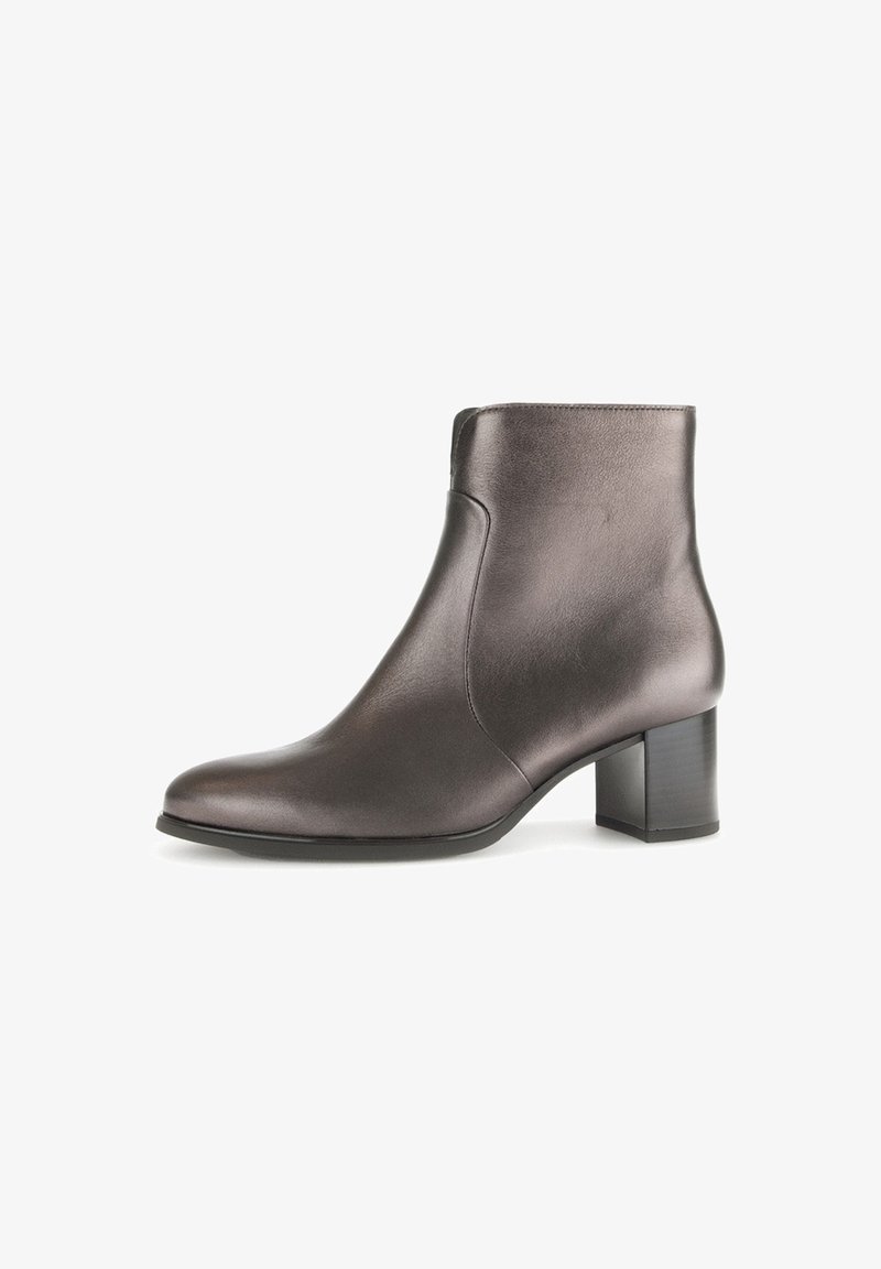 Brown leather ankle boot with a smooth finish, tapered toe, and a block heel. Direct side view highlights sleek design.