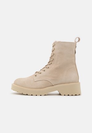 Enkellaarsjes met plateauzool - beige