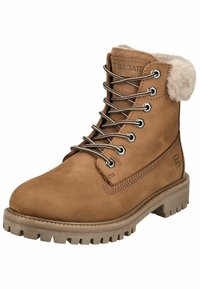 Braune Wildleder-Ankle-Boots mit Fellfutter, Metallösen und hellbraunen Schnürsenkeln. Massiver Gummisohle mit einem strukturierten Muster für besseren Halt.