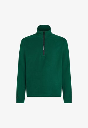 Groene fleece pullover met een hoge ritskraag. Voorzien van een zwarte rits en een zwart "Polartec" logo op de mouw. Zachte textuur.