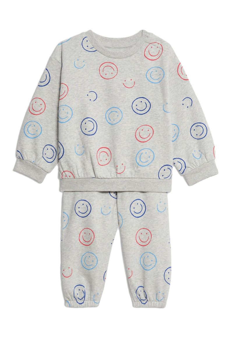 Grauer Sweatshirt- und Hosenanzug mit Smiley-Gesicht-Motiven in Blau und Rot, aus weichem Stoff mit elastischen Bündchen und Taillenbund.