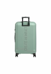 Valise rigide vert menthe avec un devant texturé, arborant la phrase "CRÉEZ UN IMPACT", roues noires et poignée télescopique.