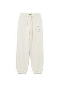 Witte joggerbroek met elastische tailleband, enkelmanchetten en drie zilveren sterontwerpen op de bovenste rechterdij.