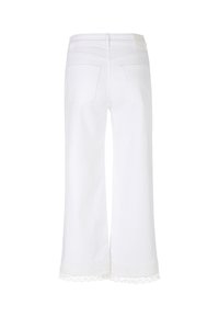 White wide-leg trousers with a textured waistband and lace trim at the hem. Features two back pockets. Cotton material.