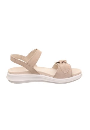 Beige suede sandal with a bow accent, open toe, and adjustable ankle straps. Features a white elevated sole for comfort.