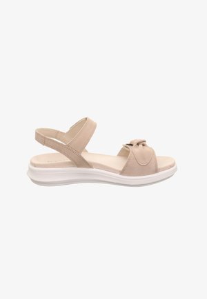 Beige suede sandal with a bow accent, open toe, and adjustable ankle straps. Features a white elevated sole for comfort.