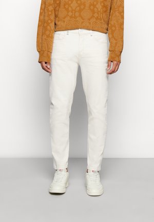 Jeans Tapered Fit - beige