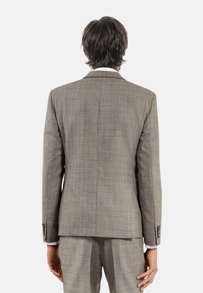 Gepunkteter Blazer in hellbraun mit taillierter Passform, einem Schlitz und silbernen Knöpfen. Verfügt über eine glatte Canvas-Oberfläche und einen kontrastierenden Revers.