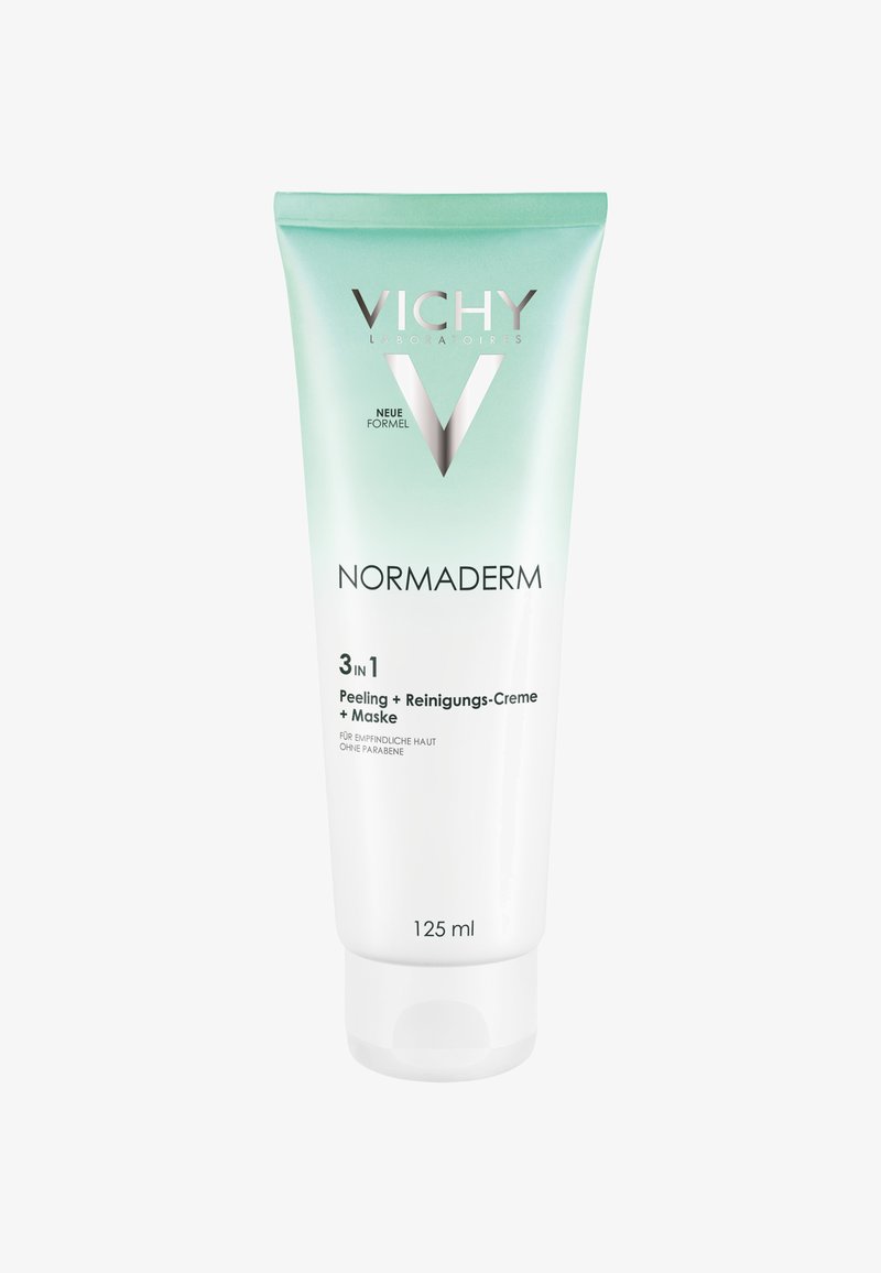 Vichy Normaderm 3-in-1 Tube, 125 ml, hat ein Farbverlauf-Design in Minzgrün und Weiß mit silberner Schrift. Enthält Peeling, Reinigungscreme und Maske.