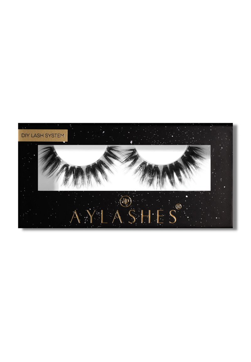 Black packaging with a transparent window showcasing two sets of black false eyelashes. Gold text reads “DIY Lash System” and “AY LASHES.”