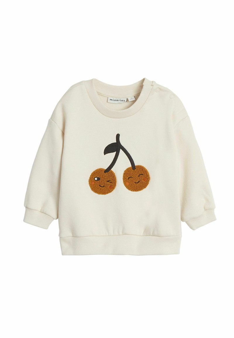 Crèmekleurige sweatshirt met een speelse geborduurde kersontwerp met lachende gezichten, ronde vorm, en geribbelde mouwen en onderkant.