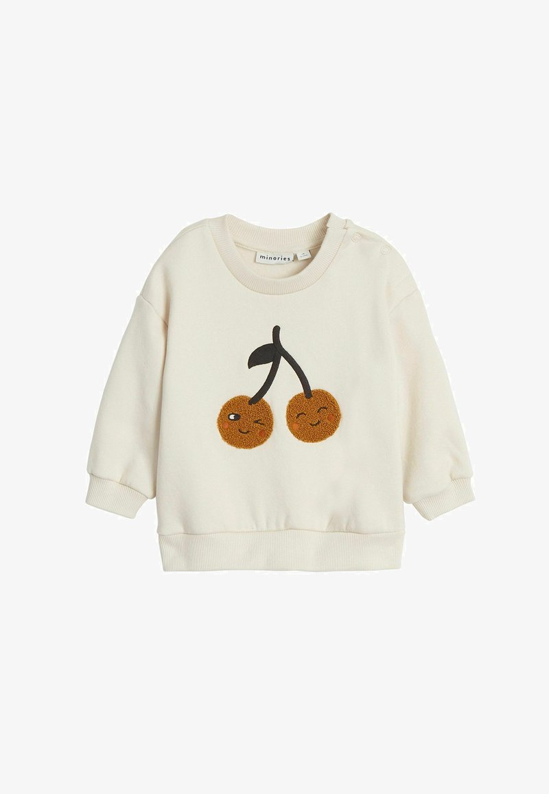 Jasny kremowy sweatshirt z zabawnym haftowanym wzorem wiśni z uśmiechniętymi twarzami, zaokrąglonym kształtem oraz ściągaczami w mankietach i na dole.