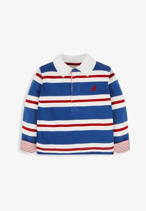 Zilas un baltas svītrainas garās piedurknes polo krekls ar sarkanām svītrām, baltu apkakli un mazu izsistītu detaļu. Ribotas aproces ar svītrainām akcentiem.