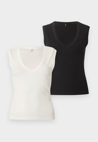 Δύο αμάνικα μπλουζάκια με V λαιμόκοψη, ένα λευκό και ένα μαύρο, απλωμένα επίπεδα σε ανοιχτό φόντο.