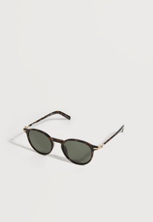 Round tortoiseshell sunglasses with dark green lenses and thin temples, placed on a plain light background.