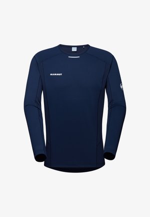 Camicia a maniche lunghe navy realizzata in tessuto elasticizzato. Presenta cuciture piatte e un colletto a girocollo, con un logo sul petto e sulla manica.