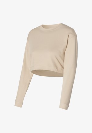 Beige, kurz geschnittenes Sweatshirt mit langen Ärmeln, aus weichem Material. Hat einen runden Halsausschnitt und gerippte Bündchen, was einen lässigen Schnitt bietet.