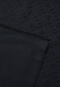 Black woven scarf featuring a subtle geometric pattern, fringed edges, and a smooth texture. Measures approximately 70x200 cm.