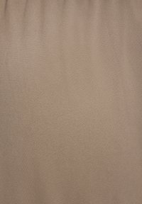 Beige fabric with a smooth, slightly shiny texture, featuring a consistent, soft finish and no visible patterns or hardware details.