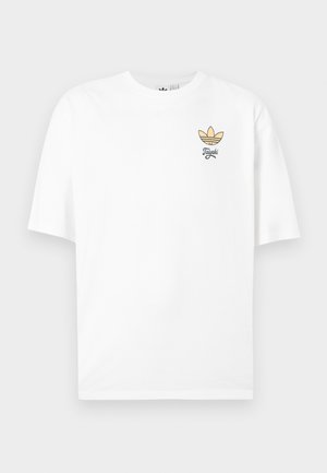 Witte katoenen T-shirt met korte mouwen. Beschikt over een klein goudzwart grafisch logo op het linkerborstgebied. Eenvoudig, ontspannen pasvorm ontwerp.