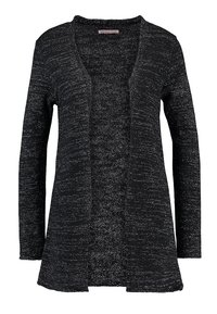 Cardigan nero con un design a maglia testurizzato che presenta macchie bianche. Abbottonatura aperta, maniche lunghe e vestibilità comoda. Materiale morbido.
