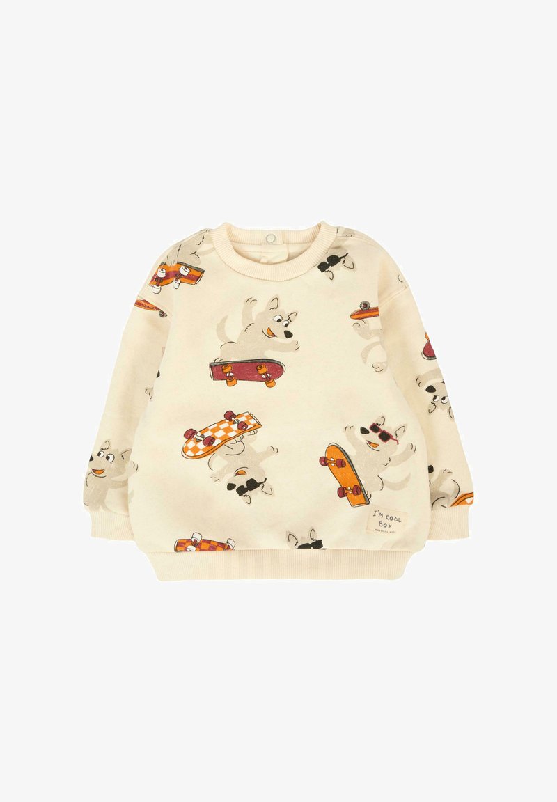 Felpa beige chiaro con illustrazioni di cani giocosi e skateboard. Polsini e orlo a costine, con un'etichetta che recita "Sono un ragazzo cool."