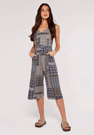 Ärmelloser Jumpsuit mit V-Ausschnitt, mehrfarbigen geometrischen Mustern in Marineblau, Braun und Beige, mit seitlichen Taschen und weitem Bein.