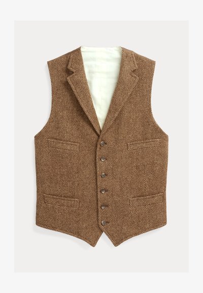 Καφέ γιλέκο με σχέδιο ψαροκόκκαλο, γιακά με σχισμή, πέντε κουμπιά και δύο μπροστινές τσέπες· εσωτερική επένδυση με ελαφρύ ύφασμα.
