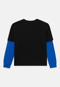 Black short-sleeve shirt with long blue sleeves, made of cotton. Features a crew neck and a relaxed fit. No visible patterns or hardware.