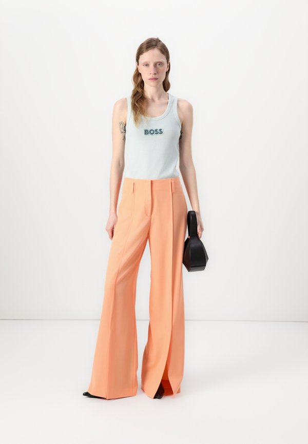 HEZENA - Trousers - bright orange3