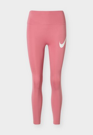 Leggings Nike roses taille haute avec un logo swoosh blanc sur la cuisse gauche, conçus pour la pratique sportive.