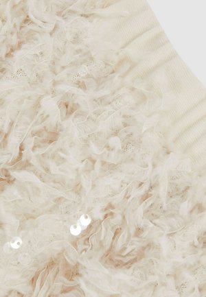 Tekstuuriga heledat beeži kangast, millel on pehmed, kulunud kiud ja hajutatud litrid ning sooniline elastne riba. Pehme ja kihiline välimus.