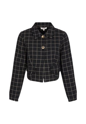 Giacca corta a quadri bianca e nera con collo a revers, tasche frontali e bottoni color oro. Tessuto strutturato con frange all'orlo.