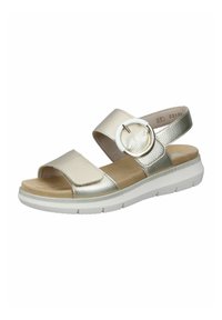 Metallic gold sandals with a wide strap, circular hardware accent, soft footbed, and chunky white sole, featuring a textured surface.