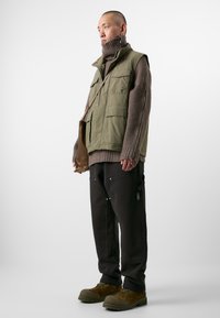 Pal Sporting Goods BIVOUAC UNISEX - Donji dijelovi trenirke - deep brown