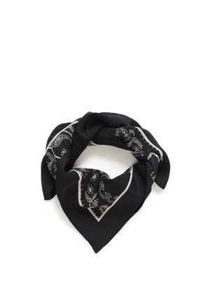 Black bandana with white paisley and floral patterns folded in a loose triangle on a white background.