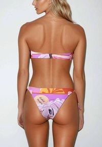 Pink and orange bikini, featuring floral patterns and a side tie. The top has a metal clasp, and the fabric is smooth with moderate coverage.