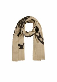 Écharpe beige en tissu doux, avec un motif à pois noirs. Les bords sont frangés et la texture est lisse dans son ensemble.