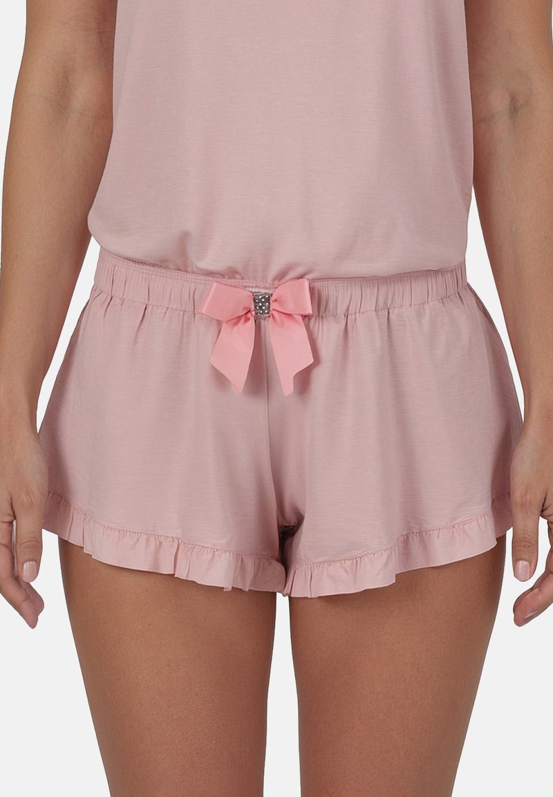 Shorts roses en tissu doux, avec un ourlet froncé, une taille élastique et un nœud avec une pièce décorative au centre devant.