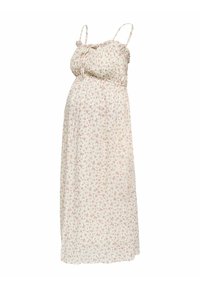 Robe de maternité crème claire sans manches avec fines bretelles et petit imprimé floral rose, présentant un buste plissé et une taille empire.