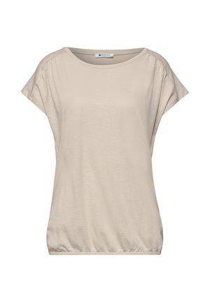 Blouse beige manches courtes avec encolure ronde et ourlet élastique froncé, en tissu doux.