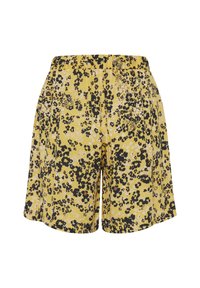 Keltaiset shortsit, joissa mustavalkoinen leopardikuosi. Kuminauhavyötärö, rento istuvuus ja leveälahkeinen malli.