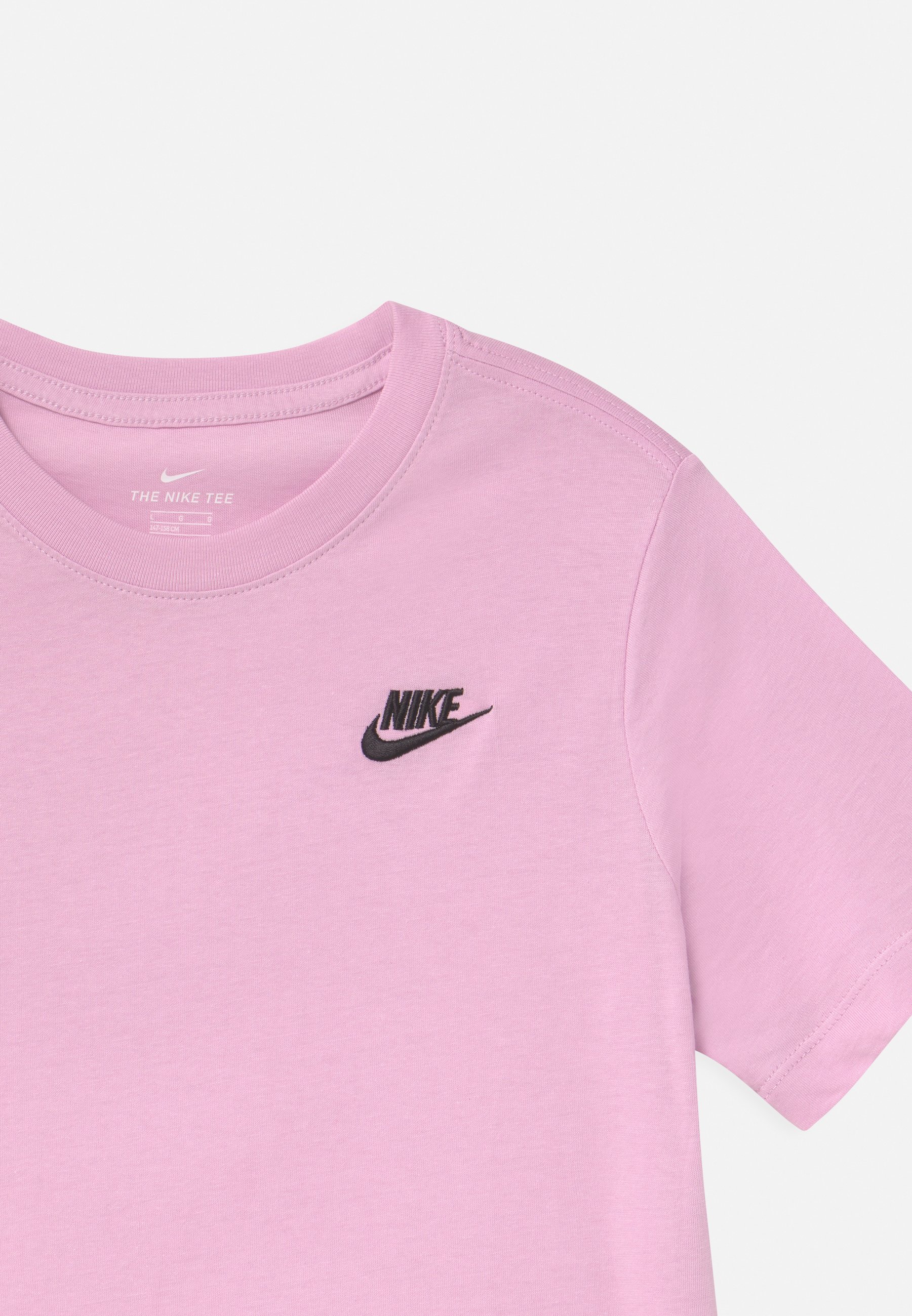 baby pink nike shirt