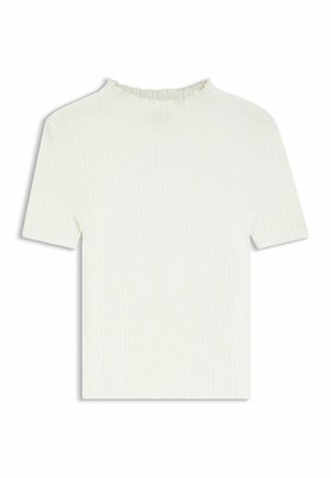 Kermanvärinen ribbineulospaita, jossa on korkeahko pääntie röyhelöreunuksella, lyhyet hihat ja istuva siluetti.